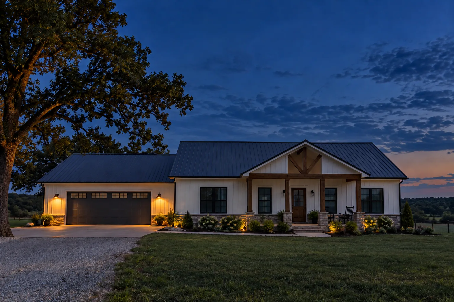 White Arkansas farmhouse beneath a clear blue-hour sky