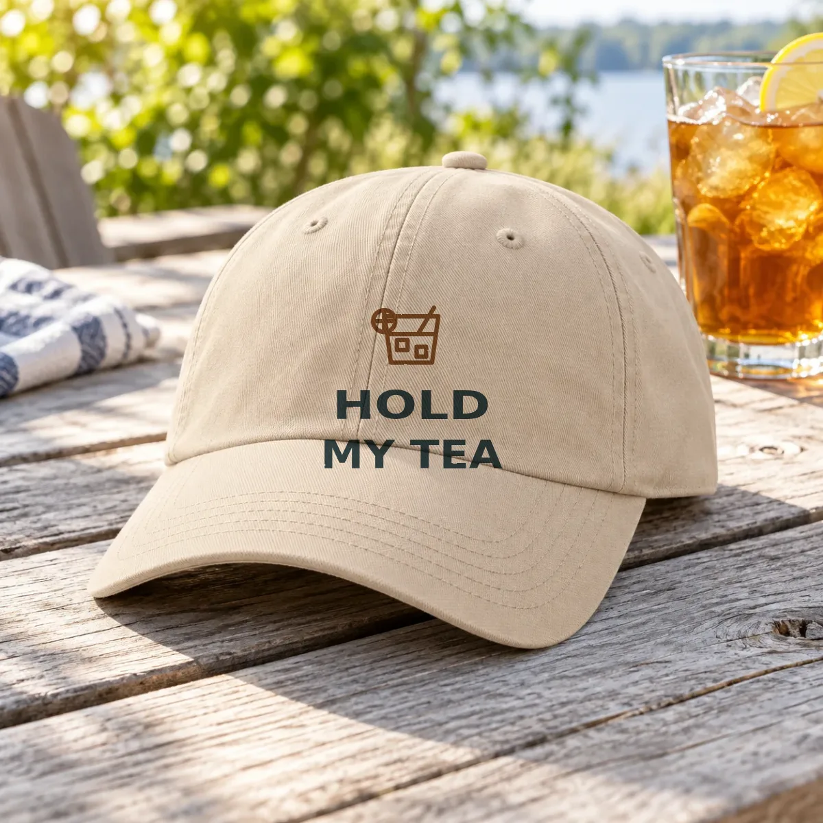 Hold my tea hat on a picnic table