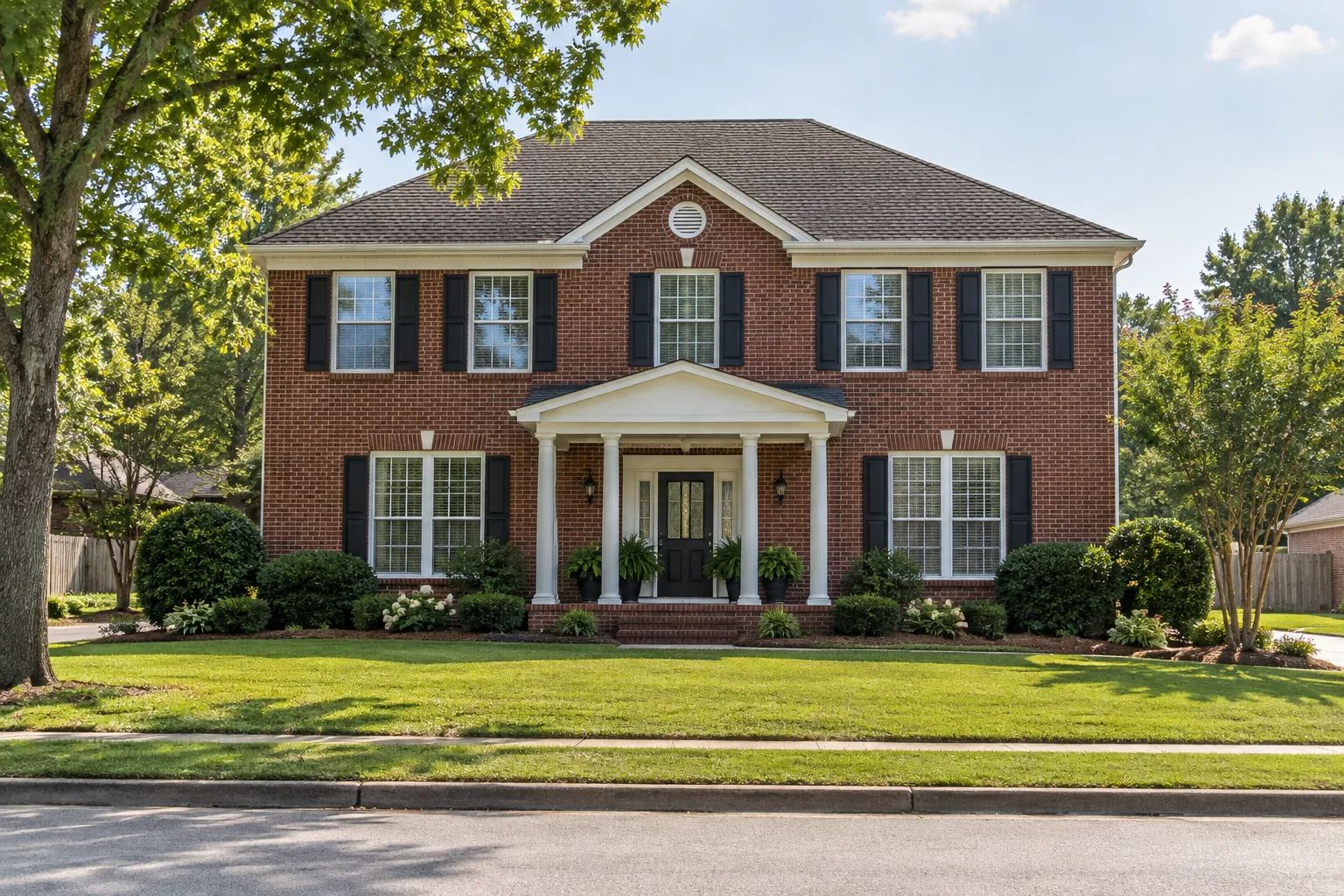 The same brick house in daylight