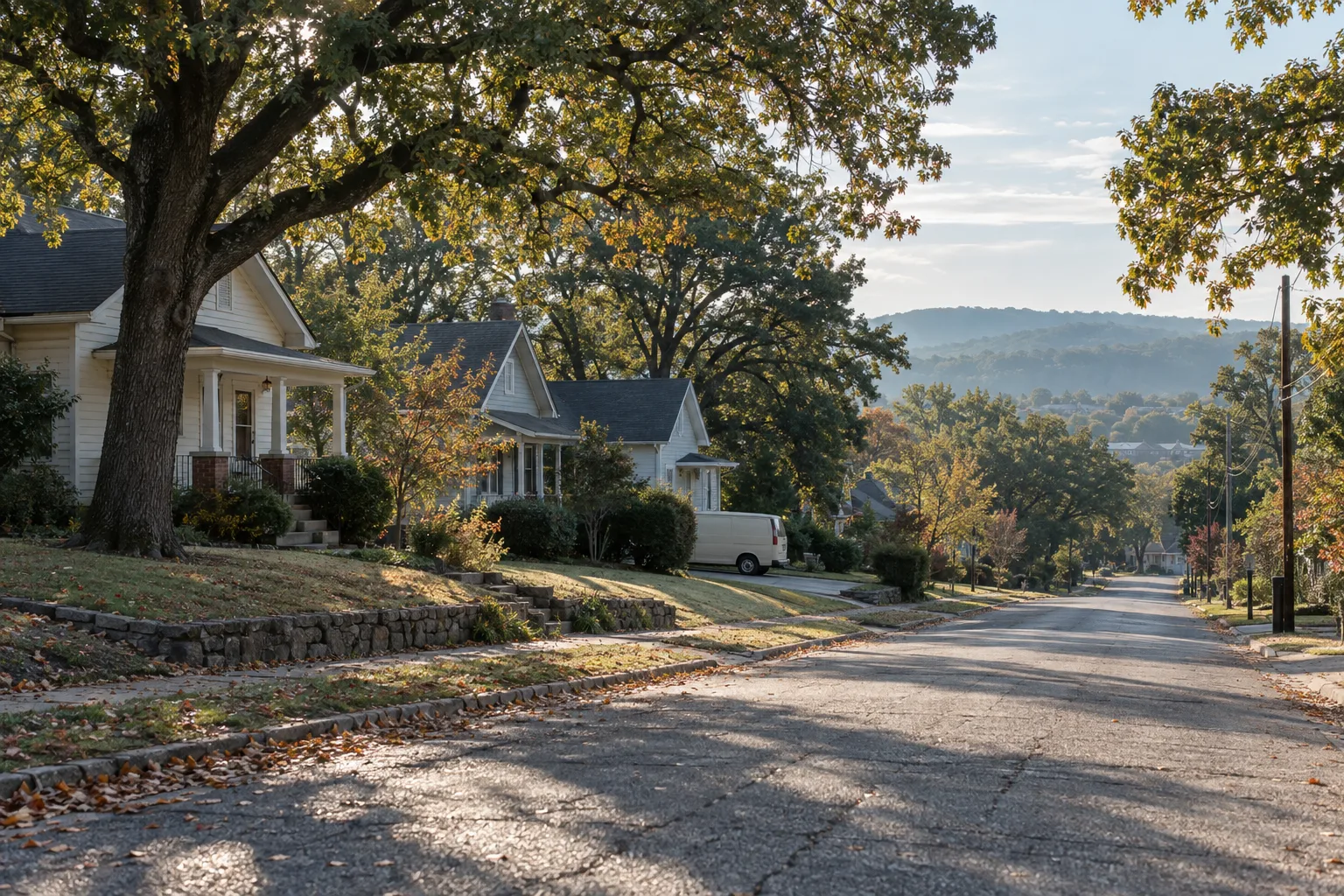 Quiet residential street in Batesville with a service van in a driveway