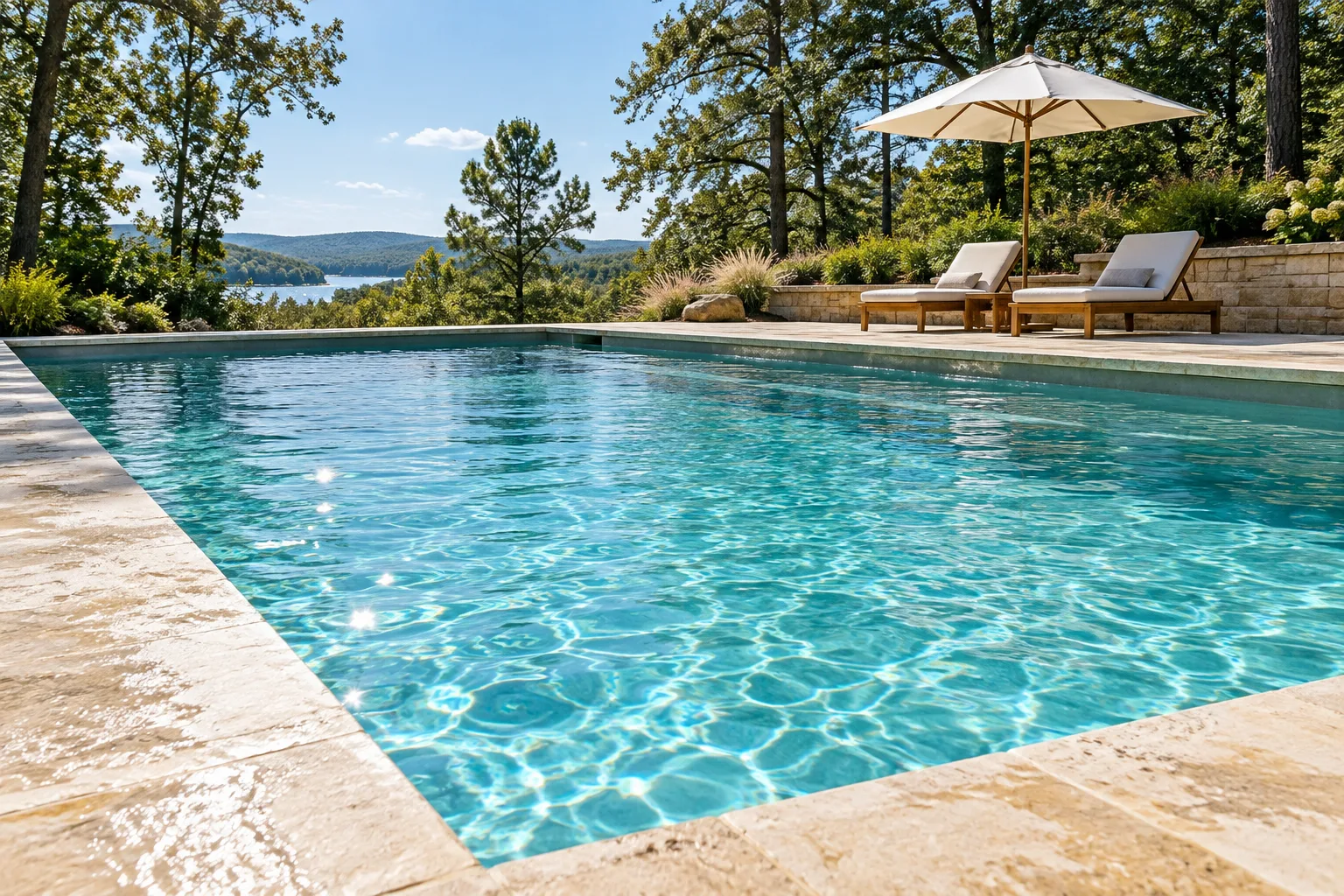 Clear turquoise water beside a sunny Arkansas pool deck.